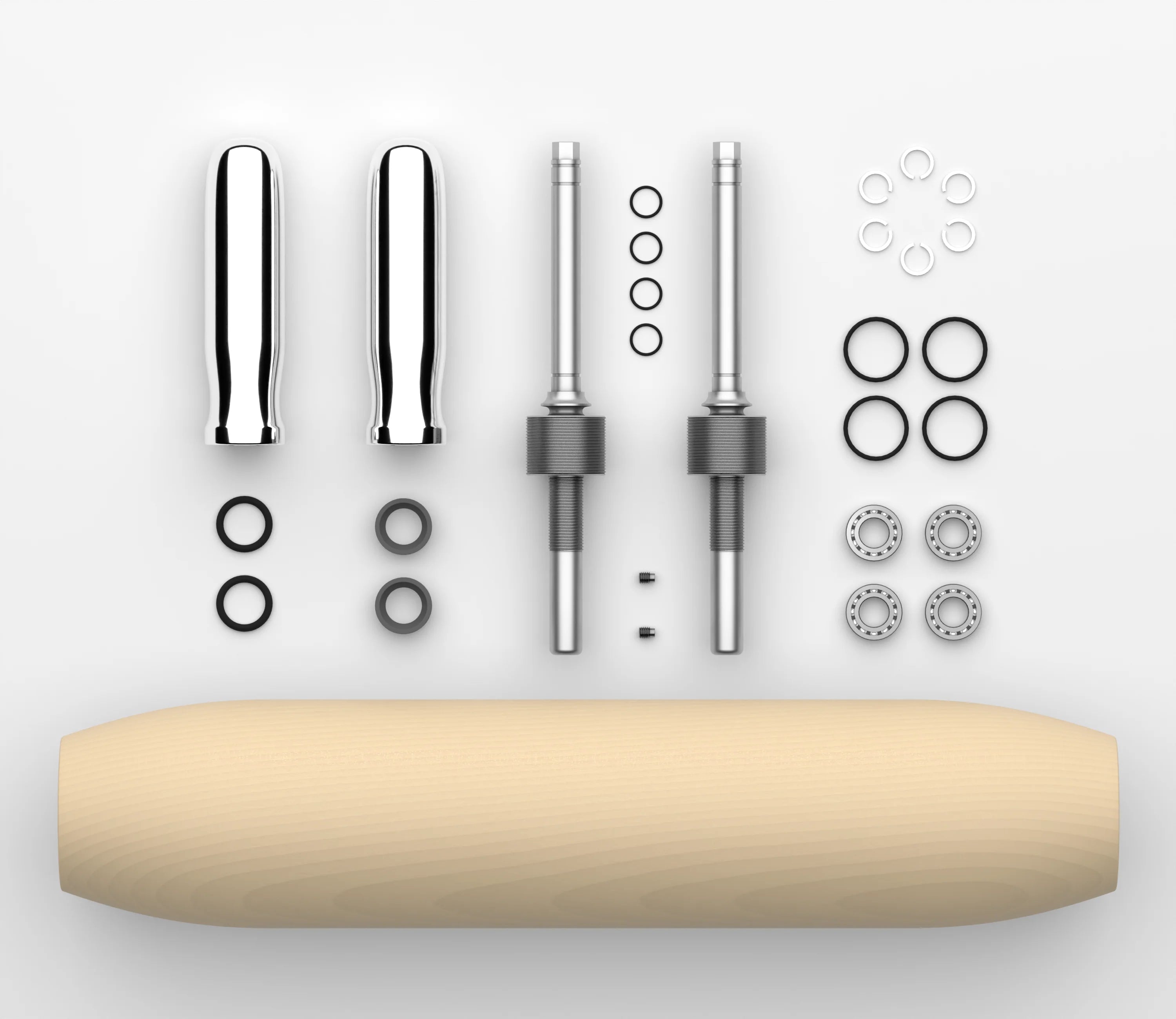 An image showing the parts that the Rolling Wonder consists of: Wooden spindle, Stainless Steel Shafts, Aluminum Handles, Precision Ball Bearings